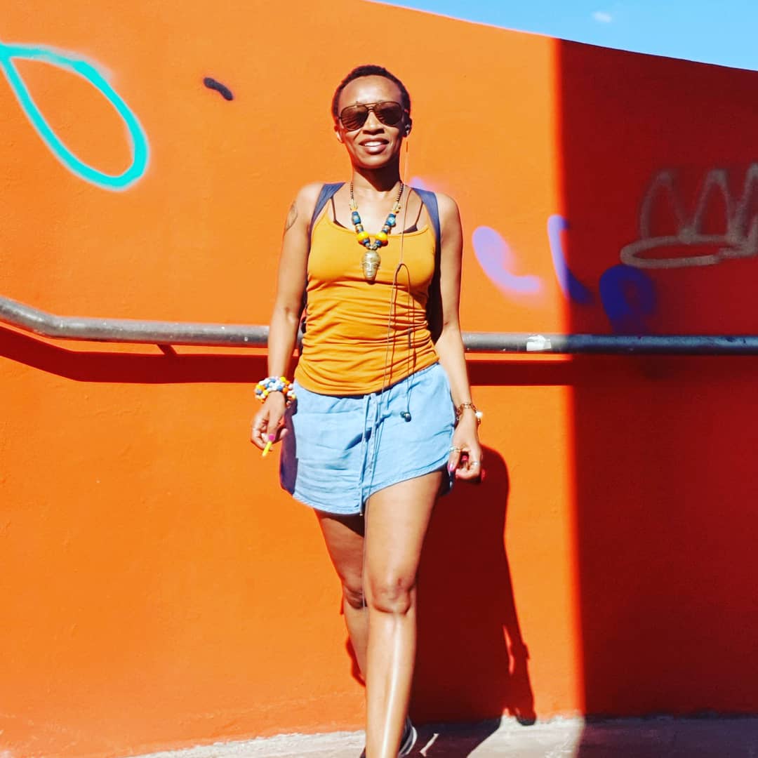 53. Swipe to FINALLY get the answer to, "Who takes your pictures?" She's sharp and yellow haha. Also, peep my  #VeinyHands. Hot af. Yeah, it is what it is. More pics on my IG. Same name.  #KenyanTraveller