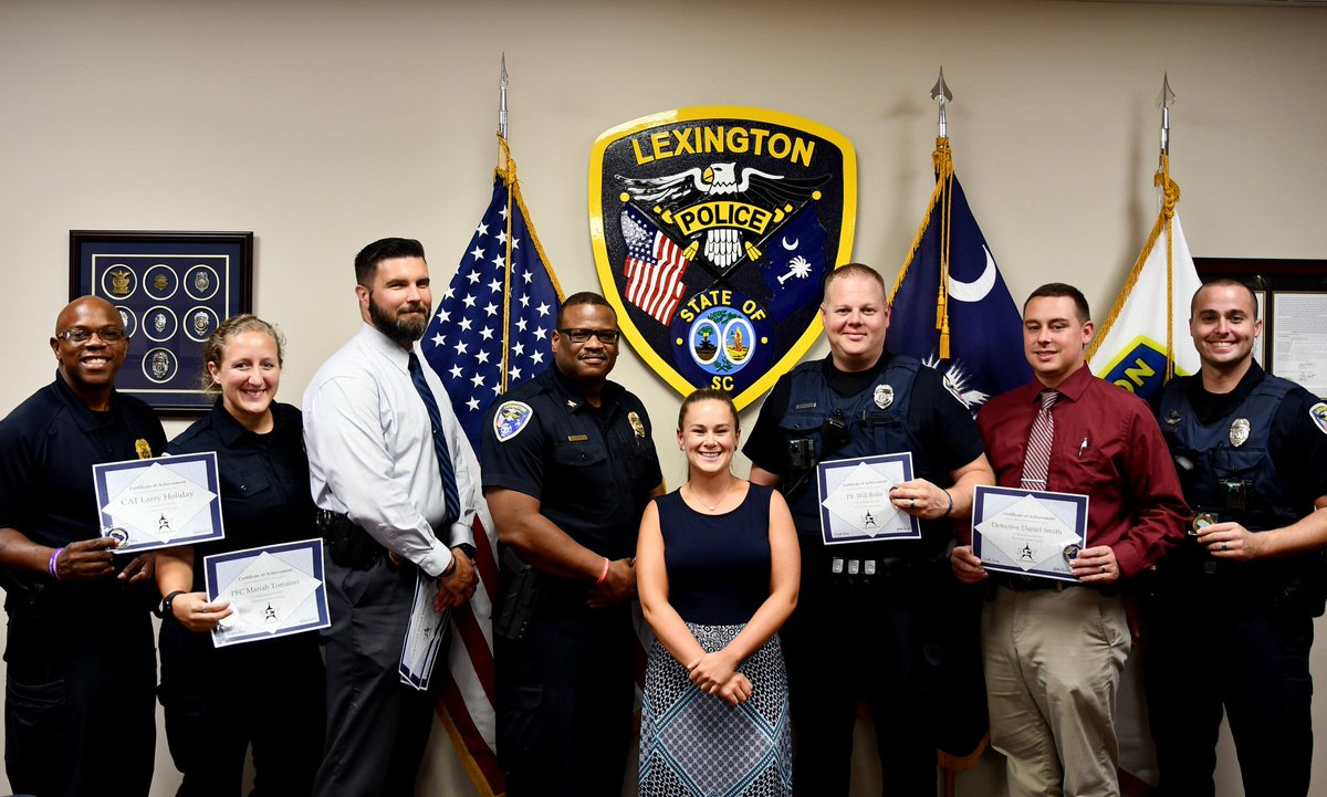 LexingtonPD's tweet photo. Thanks to Nicky King of @LRADACSC for presenting Chief Terrence Green, along with members of the LPD Midlands AET, certificates and challenge coins for the agency's involvement in the recent "Out of Their Hands" campaign.  #MidlandsAET https://t.co/hTchthpTUz