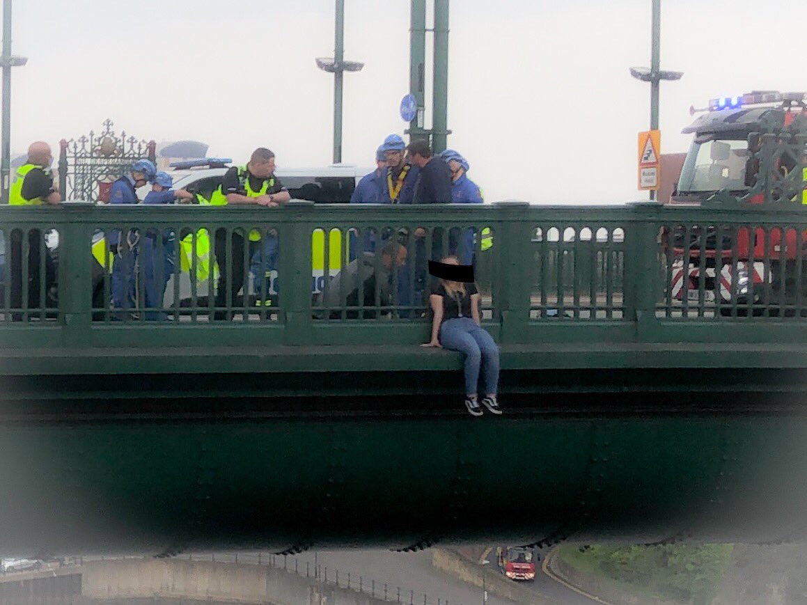 RealCiderNorth's tweet photo. Emergency services currently attempting to talk at teen from Monkwearmouth Bridge, Sunderland. If you need to talk call @samaritans for free on 116123 https://t.co/NI01CkLxWF