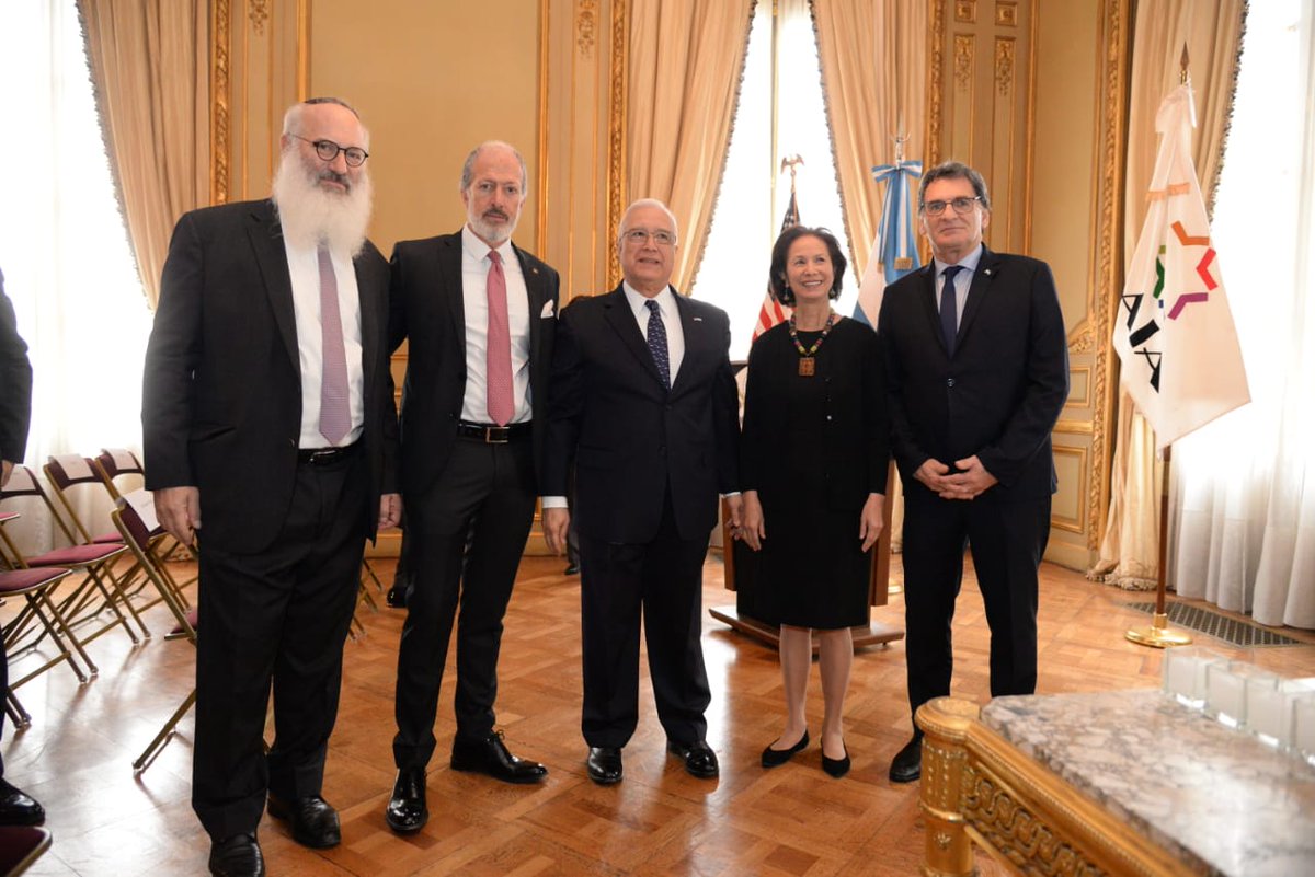 clauavruj's tweet photo. A 25 años del atentado a la #AMIA, quiero agradecer al Embajador de los EE.UU, Edward Prado, y a @DAIAArgentina por permitirme participar del emotivo homenaje en memoria de todas la víctimas del terrorismo fundamentalista alrededor del mundo. #AMIA25 años. @USAmbassadorARG https://t.co/eXG6qWvHei