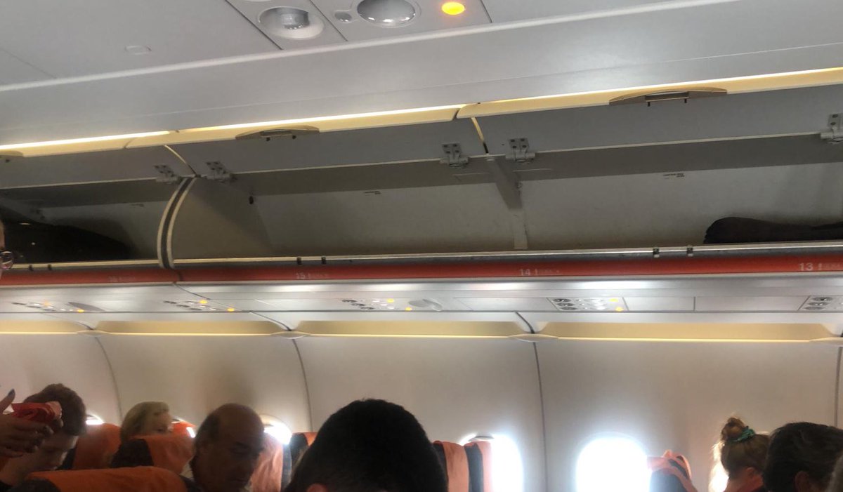 CarolaRedondo's tweet photo. @easyJet how can you explain that my hand luggage has been sent to the airplane hold when we have all this space inside? https://t.co/Or7BqTH9e3