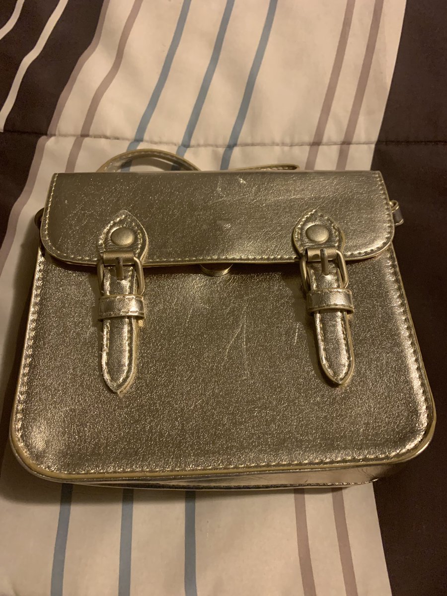 ‼️‼️‼️ Attention Everyone ‼️‼️‼️
We are looking for the owner of this golden bag. Someone left it at one of the shows this past weekend and we want to return it to its rightful owner. If you have any idea of whose it may be, email <a href="/mlvantrease/">Mitchell Vantrease</a> (mitch.vantrease@gmail.com) to claim