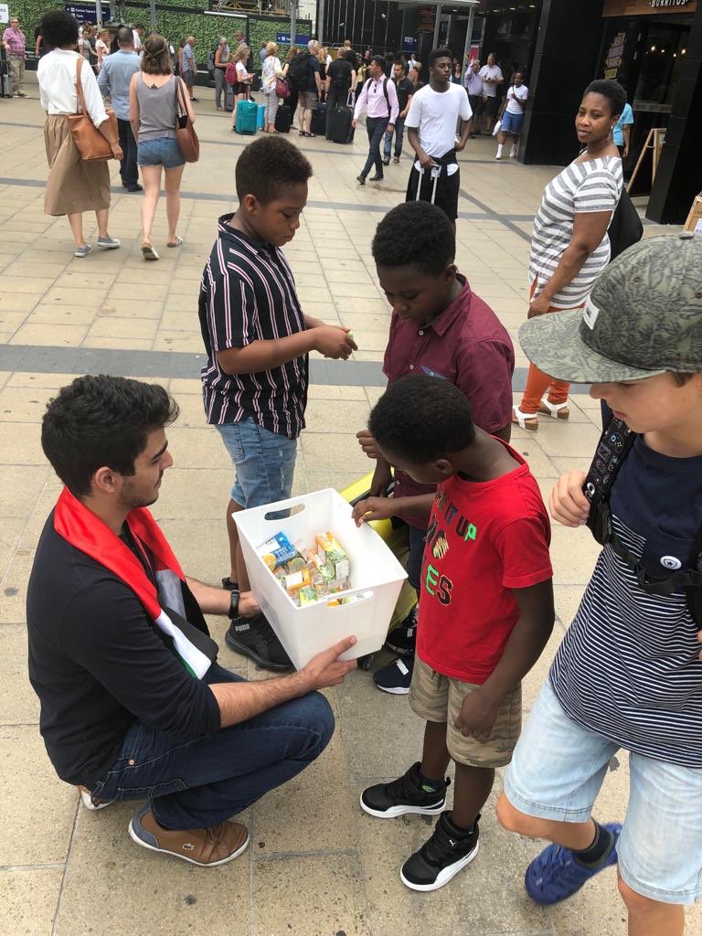 sultanalzz's tweet photo. A glimpse of the act, by Emirati students in the UK, to keep Londoners &amp; those in need hydrated during the hottest day in London https://t.co/QEtMlqjHYi