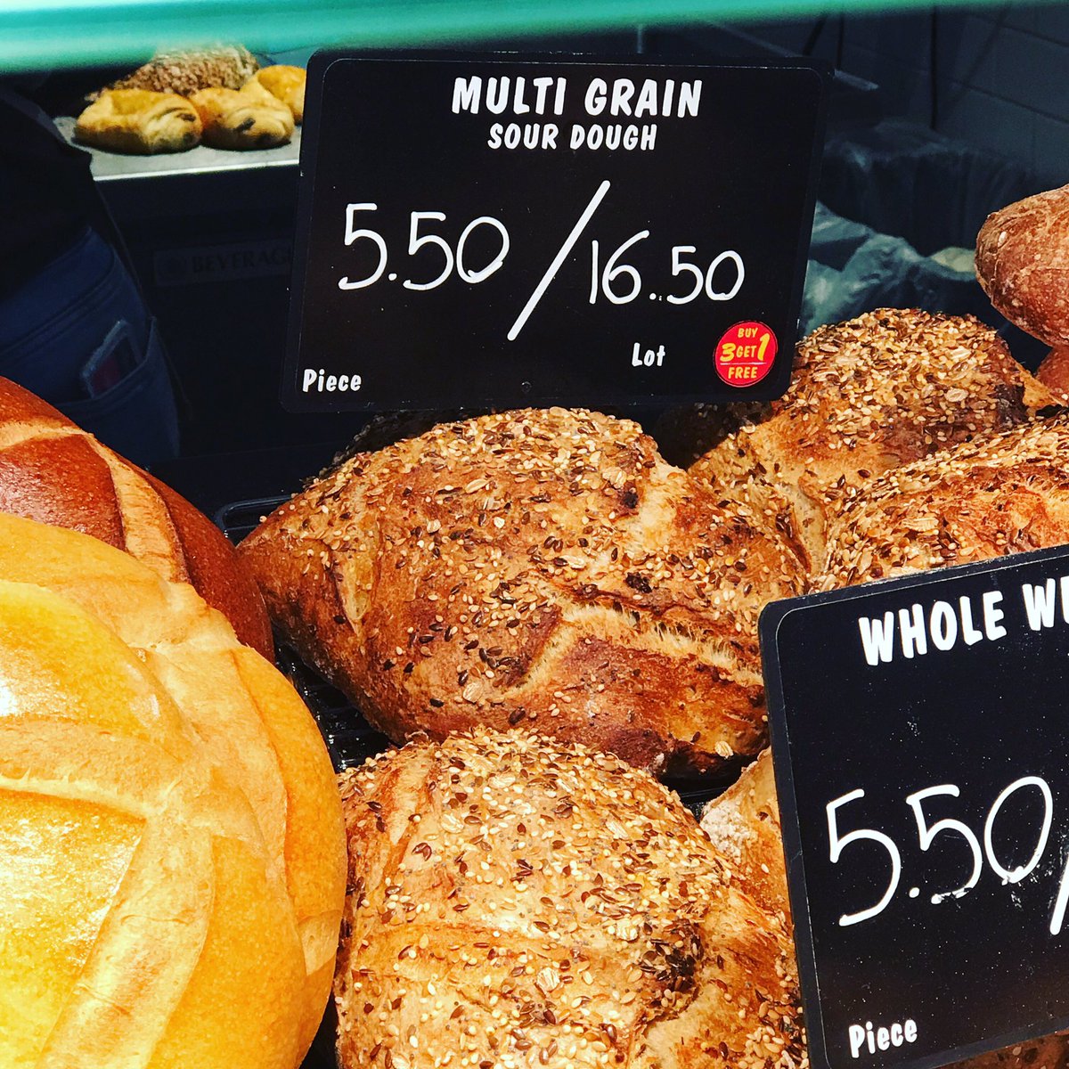 Our bakers use brown flax seeds, gold flax, millet seeds, blue poppy, hulled sunflower seeds, flour and sourdough in our MultiGrain Sourdough Bread! #bread #frenchbreads #multigrain