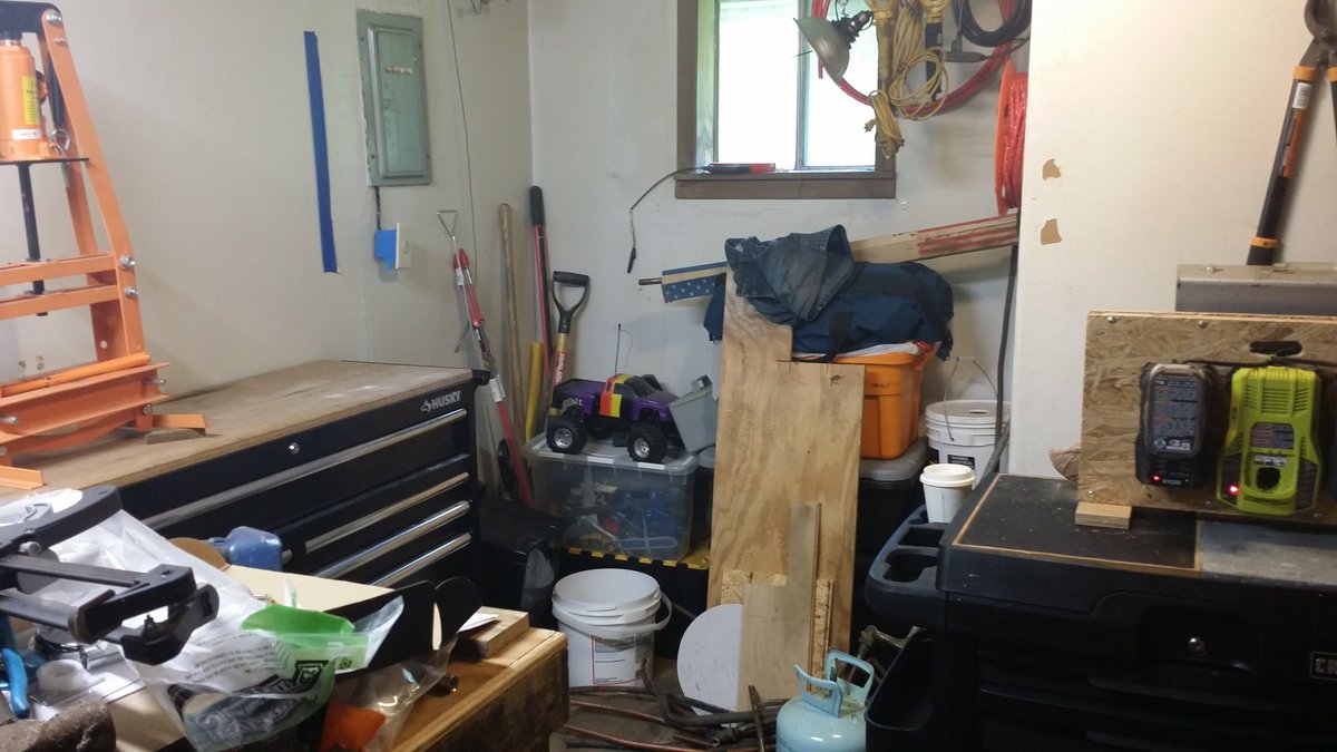 Moved the big tool bins todayPeople who have seen my temporary shop are impressed at what I am getting in there--kind of surprised myself actuallyNo you can't see the workbench all the time but supplies come & goBegan installing the impervious wall covering on the tub as well