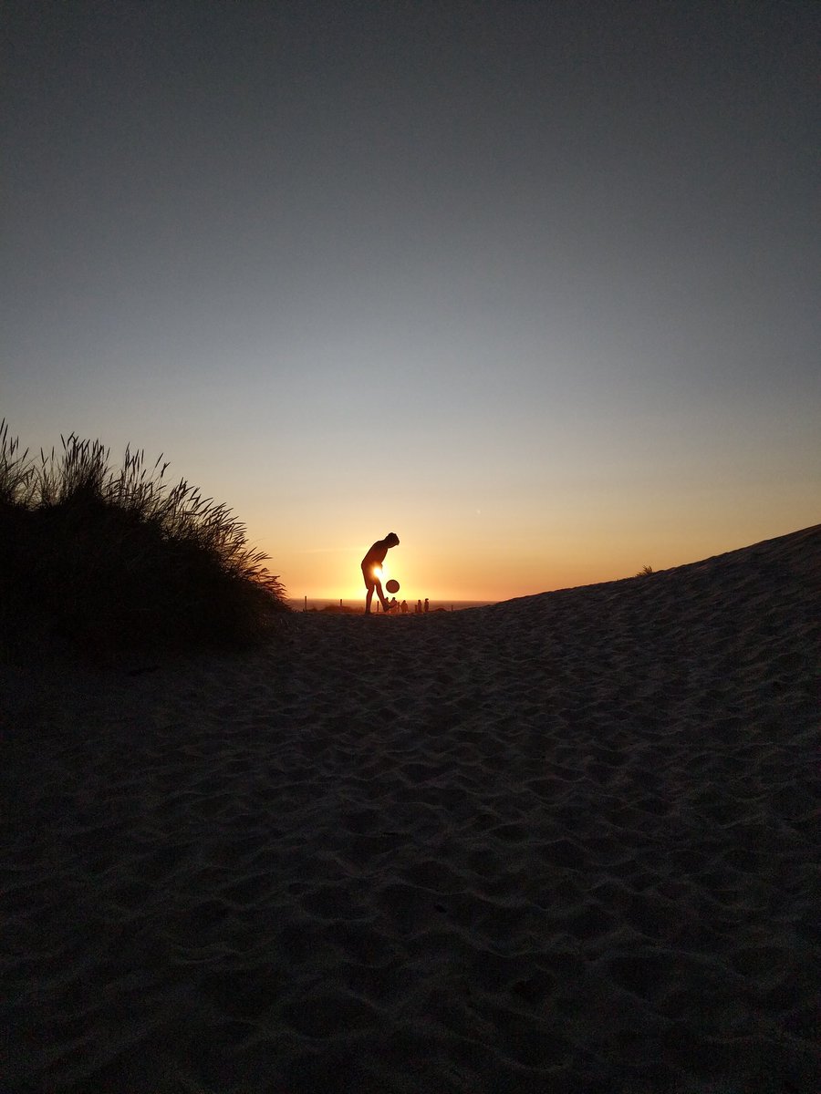 This kid. Soccer for life. Sunset in Pacific City on the Oregon coast.