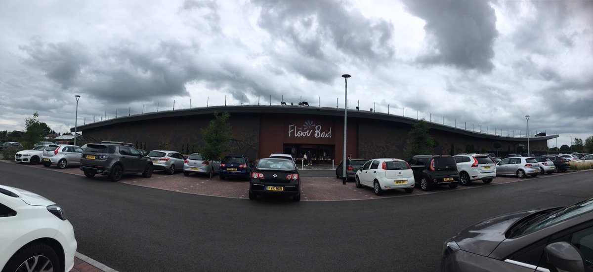 CharlEHilton's tweet photo. Day off and finally got to see the sheep on the roof at @TheFlowerBowlEC definitely one of my favourite projects! @LiquidPlastics #GreenRoof #NewBuild https://t.co/ecdp6latXZ