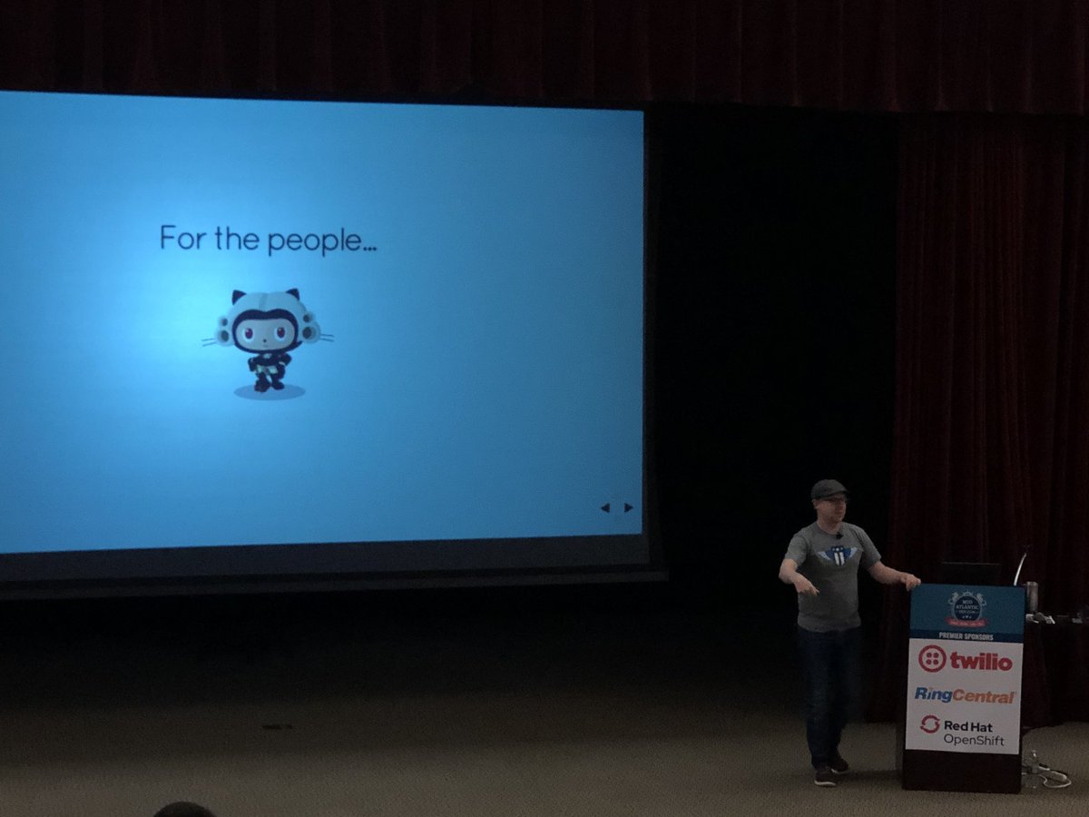 Watching <a href="/jakerella/">Jordan Kasper</a> talk about Open sourcing the DoD (Co-presented by the octocats!!) #middevcon