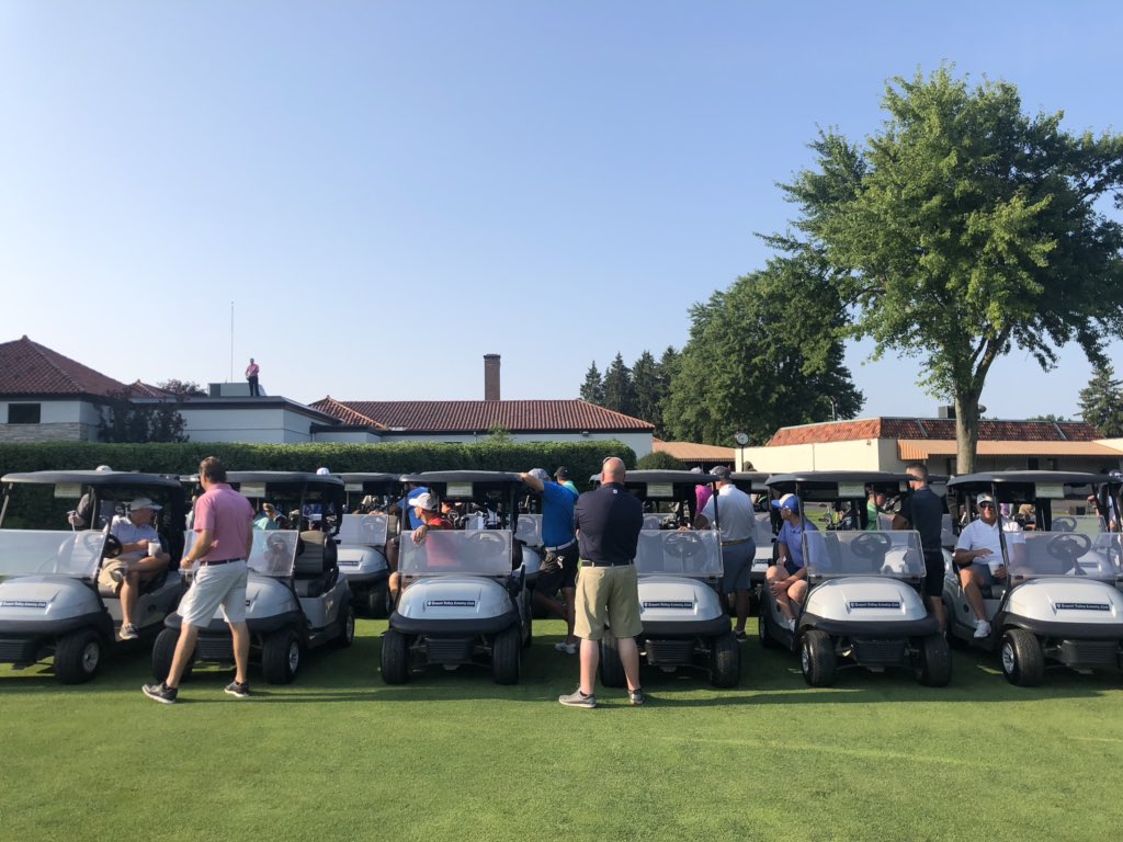 Tee shirt cannon off the roof. Your number called? Chip-off for a Golf trip in Naples!