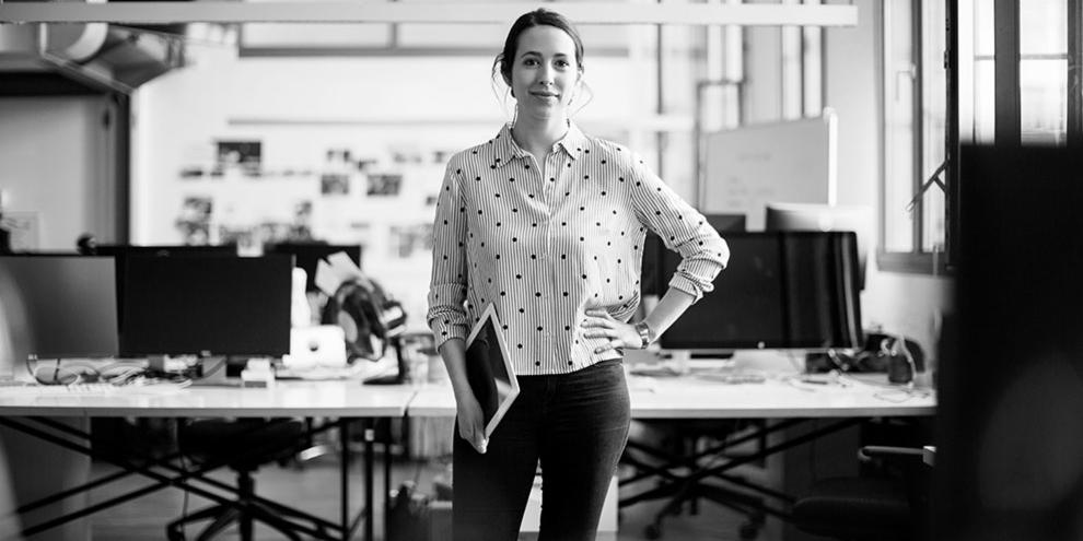 professional woman holding tablet