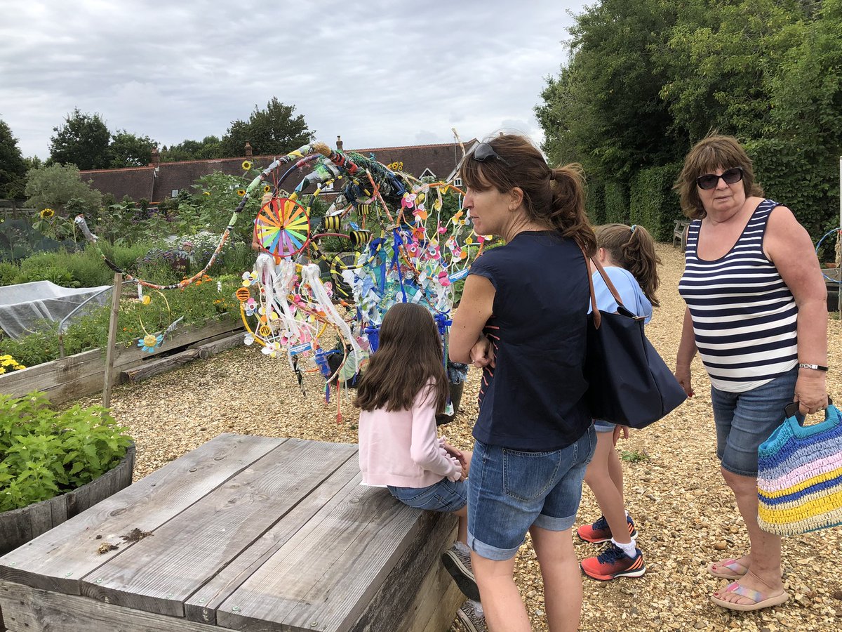 NewForestSussed's tweet photo. Our #plastictrashclash tree is still gaining new hoops New one from @PennInf @PatricksPatch @FairweathersGC These two child visitors from Winchester were keen to add one! https://t.co/nyYaQWAbFY