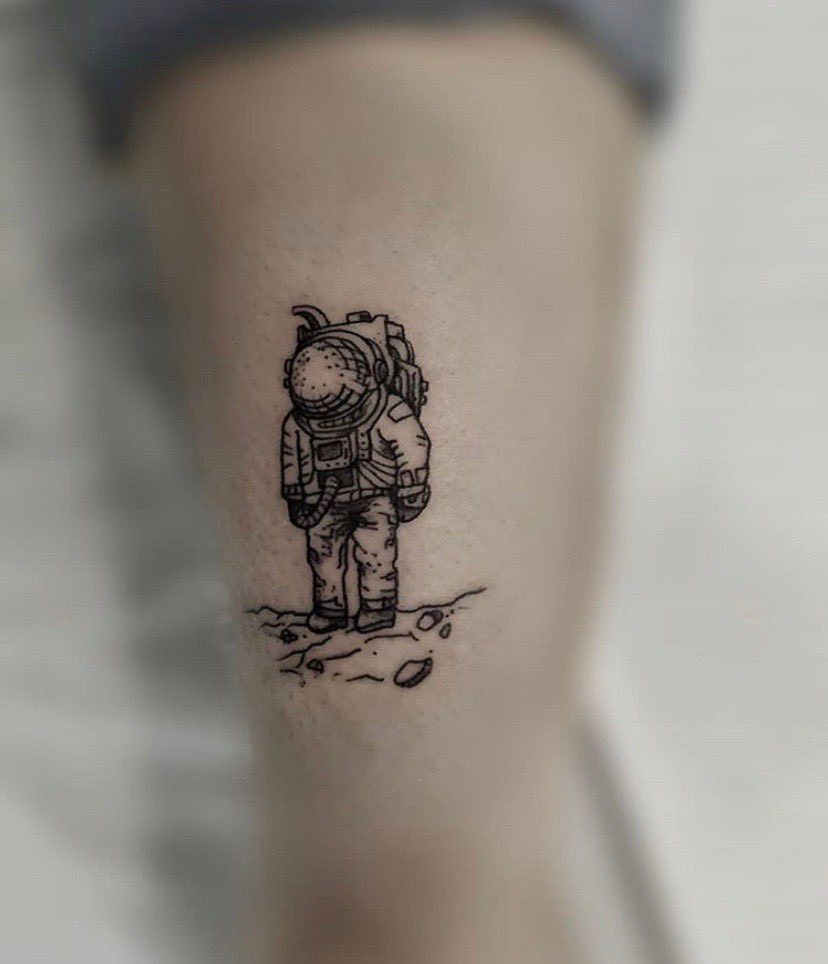 Astronaut and an alien spaceship tattoo  Tattoogridnet