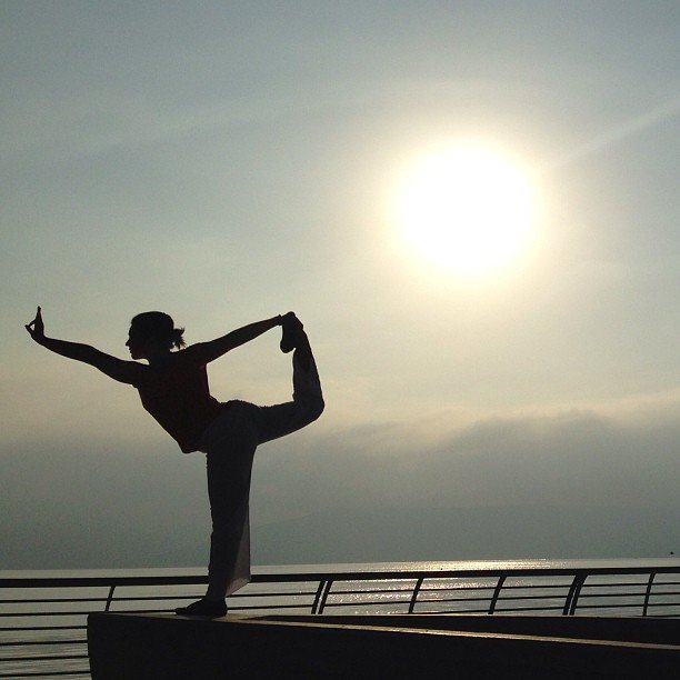 Tulsi Gabbard casually doing yoga. 