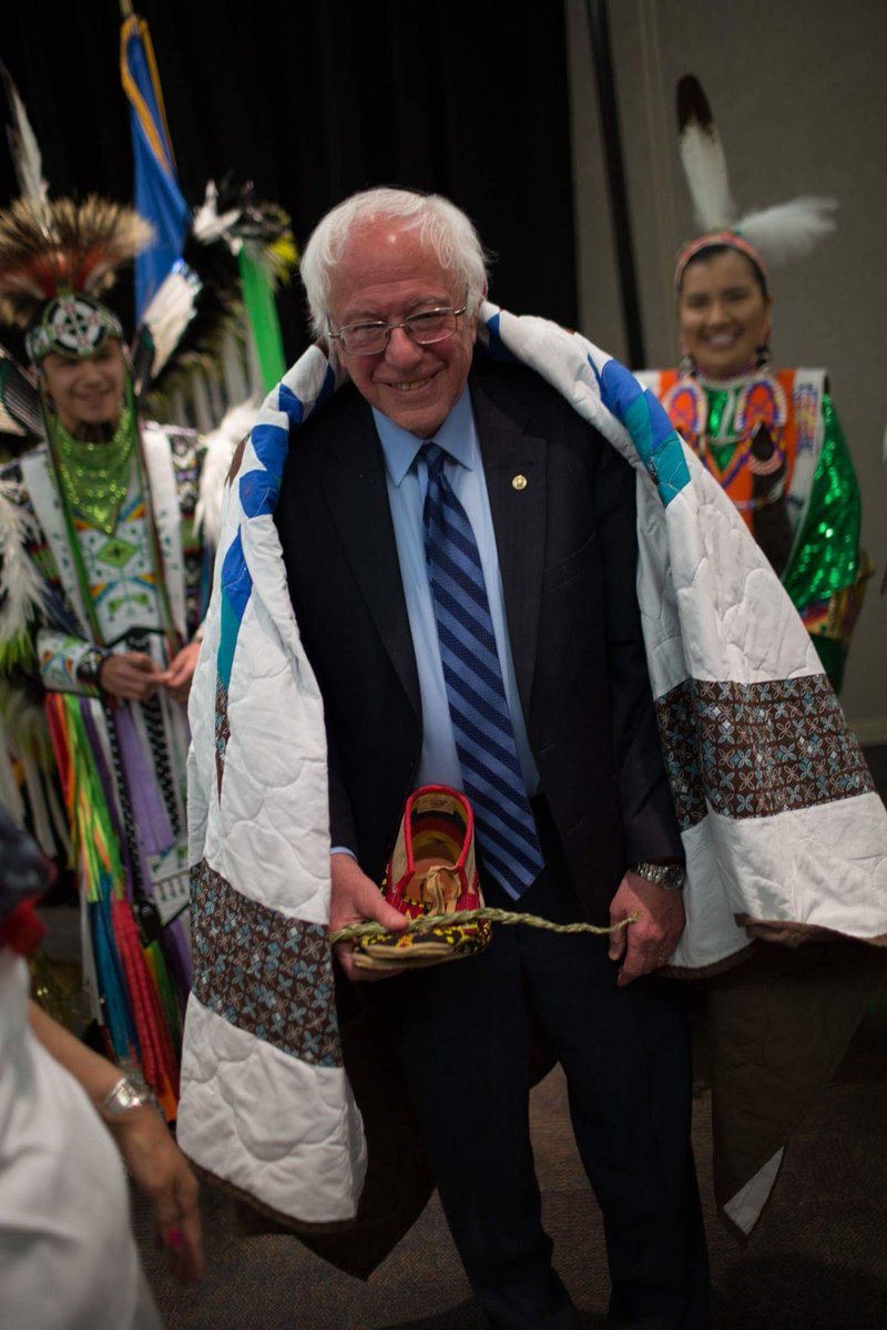SenseOf_OUTRAGE's tweet photo. @ForSalish @BernieSanders Thank you for your continued support for @BernieSanders

The fires lit by @BernieSanders in 2016 burn brightly still. CHANGE IS COMING
UNITY AGAINST FASCISM

"The Coast Salish call him Dxʷshudičup - 'the one lighting the fires for change and unity'"
https://t.co/4HzJKSXJu9 https://t.co/WElV6biN8V
