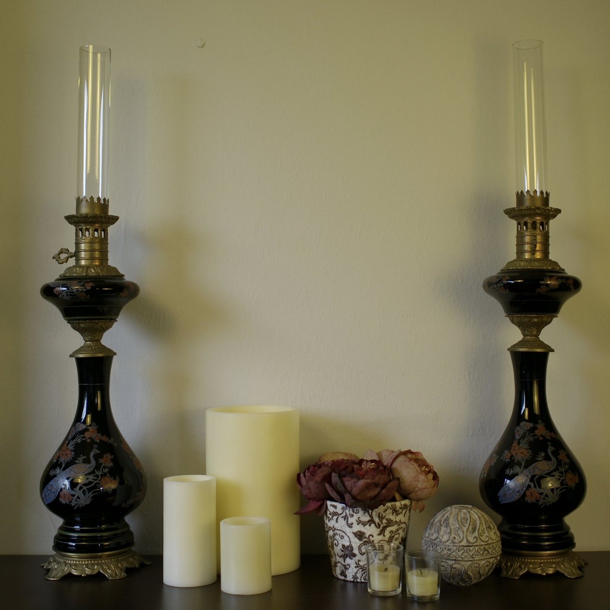 NAPOLEON III GLASS LAMPS

This pair of dramatic Emperor Napoleon III lamps is made from French hand blown, demi-crystal, black opaline glass, delicately hand painted with peacocks, butterflies and flowers.  More details on our website: coindeparadis.co.uk