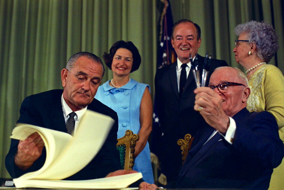 BeschlossDC's tweet photo. In presence of Harry Truman, LBJ signs bill creating Medicare and Medicaid, Truman Library, Independence, Missouri, July 30, 1965: https://t.co/tyJgB6I44j
