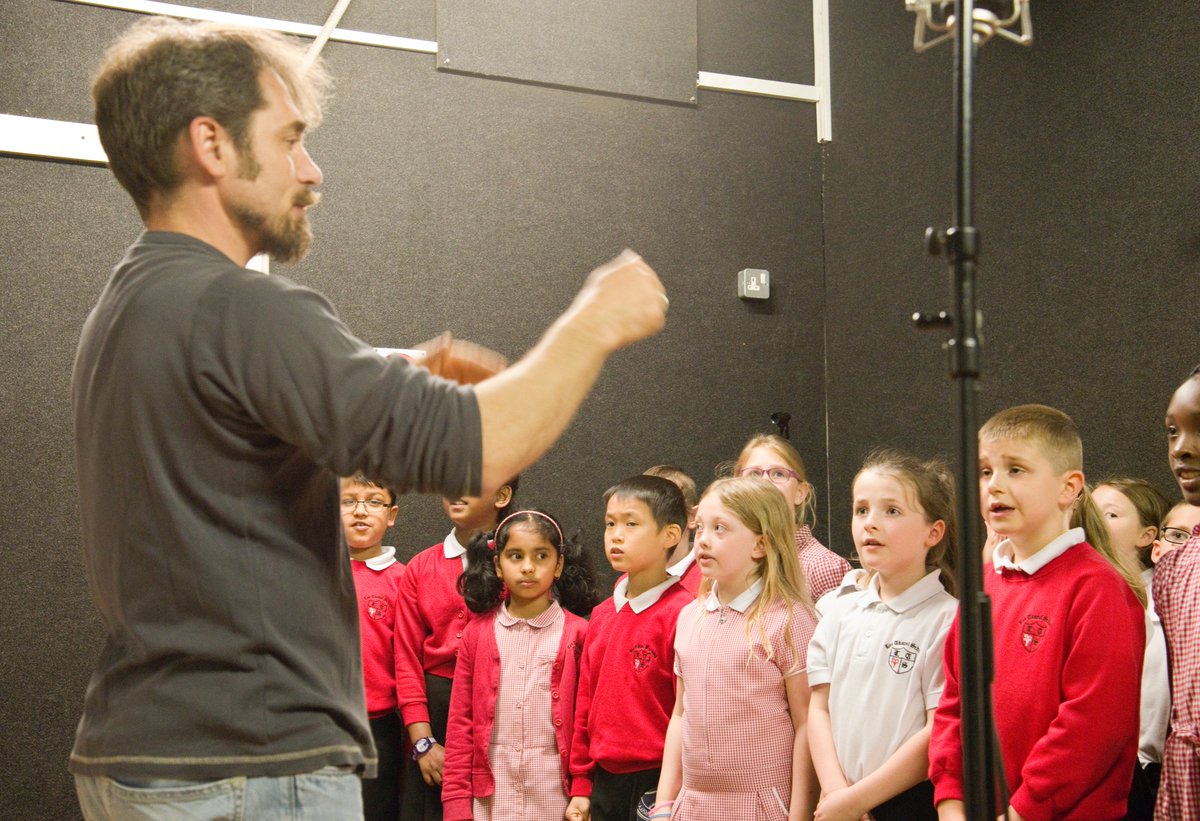 BasildonTwin's tweet photo. Hands up if you remember this from June 2016. It's Hannes from #Heiligenhaus with @Leechapelsch choir, @Beauchampssch choir, Fricklesome Amsel and the finished article - The Padre CD #MagicMemory #LestWeForget https://t.co/RHQn6qFTSV