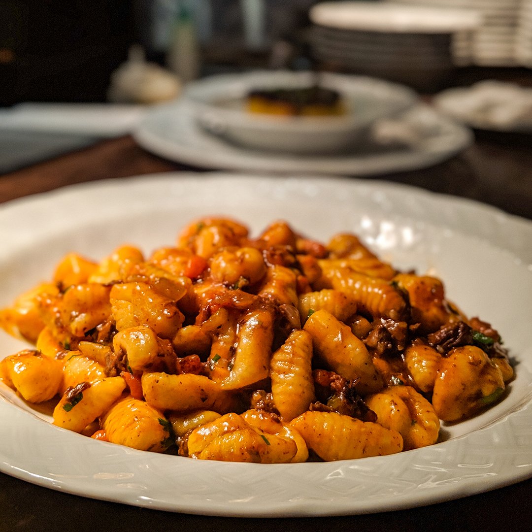 Housemade Saffron Potato Gnocchi, Beef Ragù, Thyme, Parsley, Pecorino. Have a half portion as a first course or make it a main course. #morethangreatsteak #asadoargentino #foremanwolf