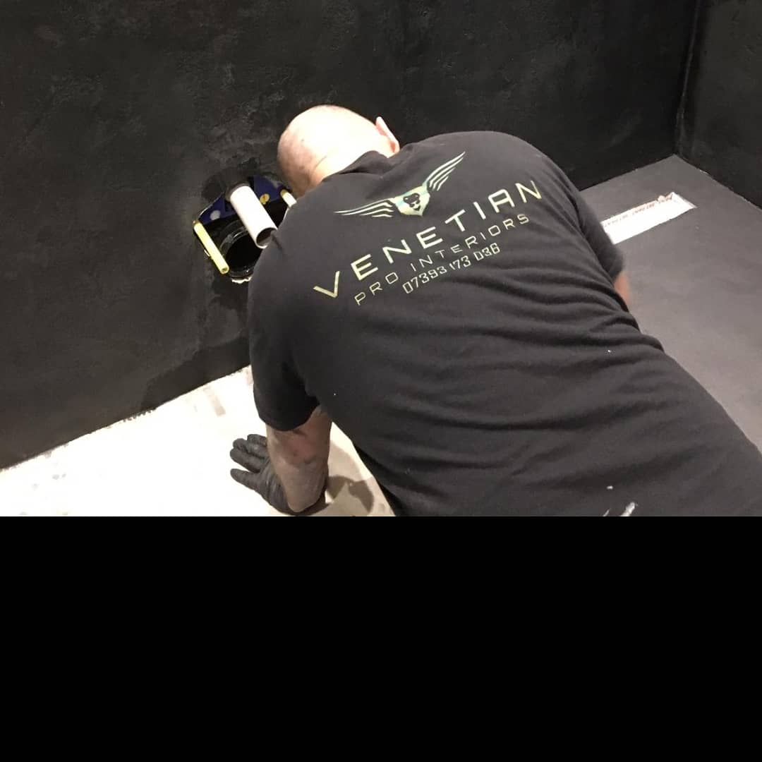 A project we completed in a black dragged pitted texture a white  microcement floor  an complimented with gold fixtures.

#designideas #decorativeplaster #venetianprointeriors #marmorino #clients #construction #projects #homesweethome #homedesignideas #bathrooms #trend #stucco