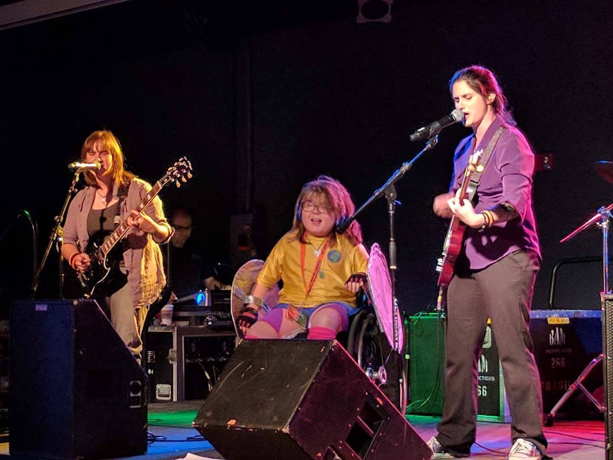 Danwhite1972's tweet photo. Want to brighten your Sunday? Look at Emily’s face as she ROCKS the stage with @callingutopia on stage in NY CITY, 2017 https://t.co/0TFPY7bfMM
