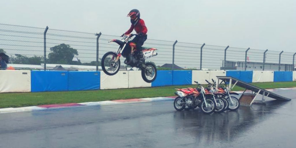 tigersdisplay's tweet photo. It’s fair to say the weather isn’t on our side for the @thundersportgb Duke of Donington at @DoningtonParkUK this weekend but if it’s safe to ride, that’s what we do - you can see just how wet that track is! 11 year old William showing us how it’s done 👌🏻 #inthewet #tigersmdt https://t.co/PmG9zxCAc2