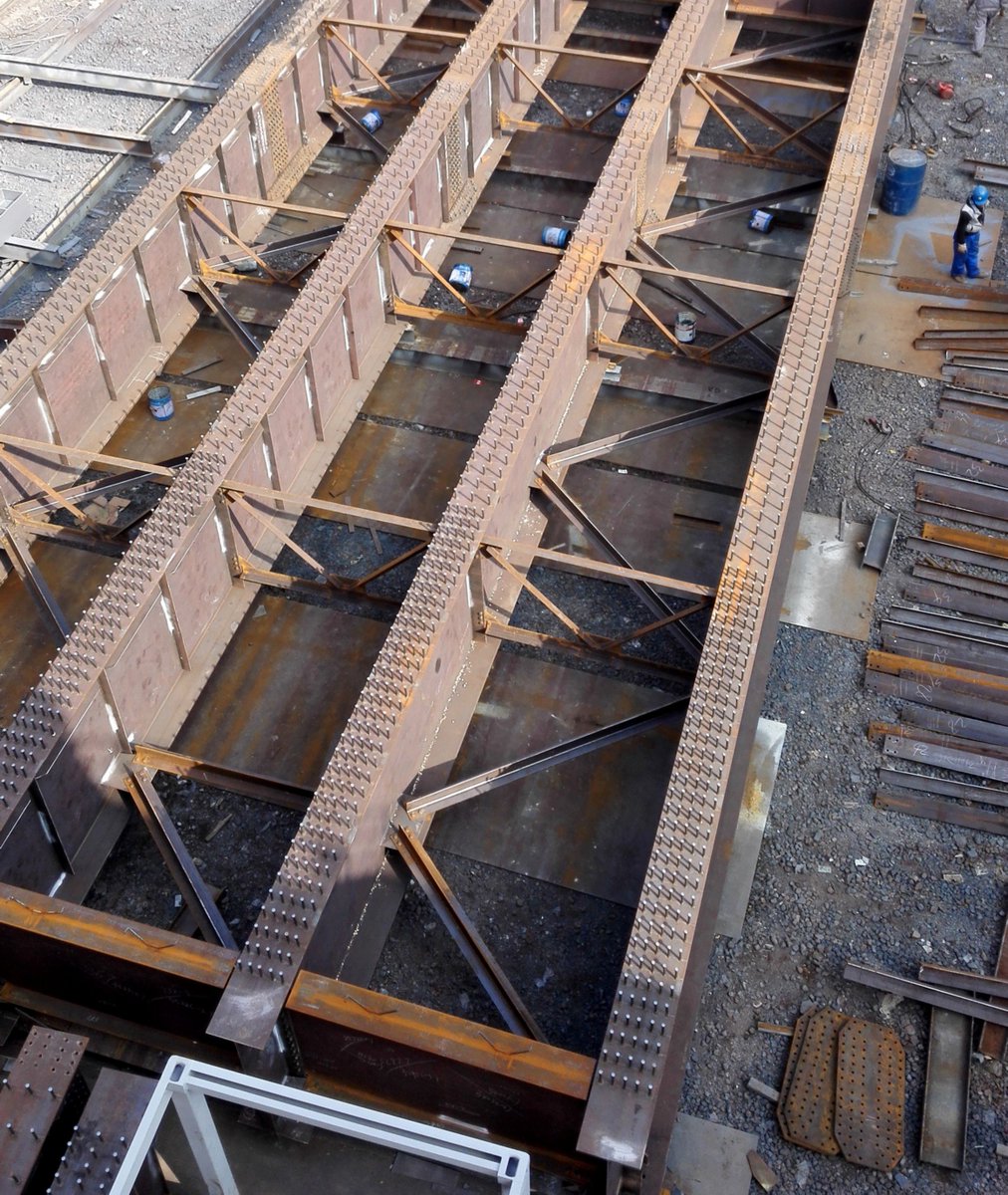 escsteel's tweet photo. Factory yard Trial assembly for bridge girders for New Britain Bridge Project (PNG) #steelstructure #steelfabrication #bridgeengineering #bridgestructure #prefabricatedstructures #fabricationcompany - https://t.co/dyJYRmqbiI https://t.co/5ogvqq1bA0