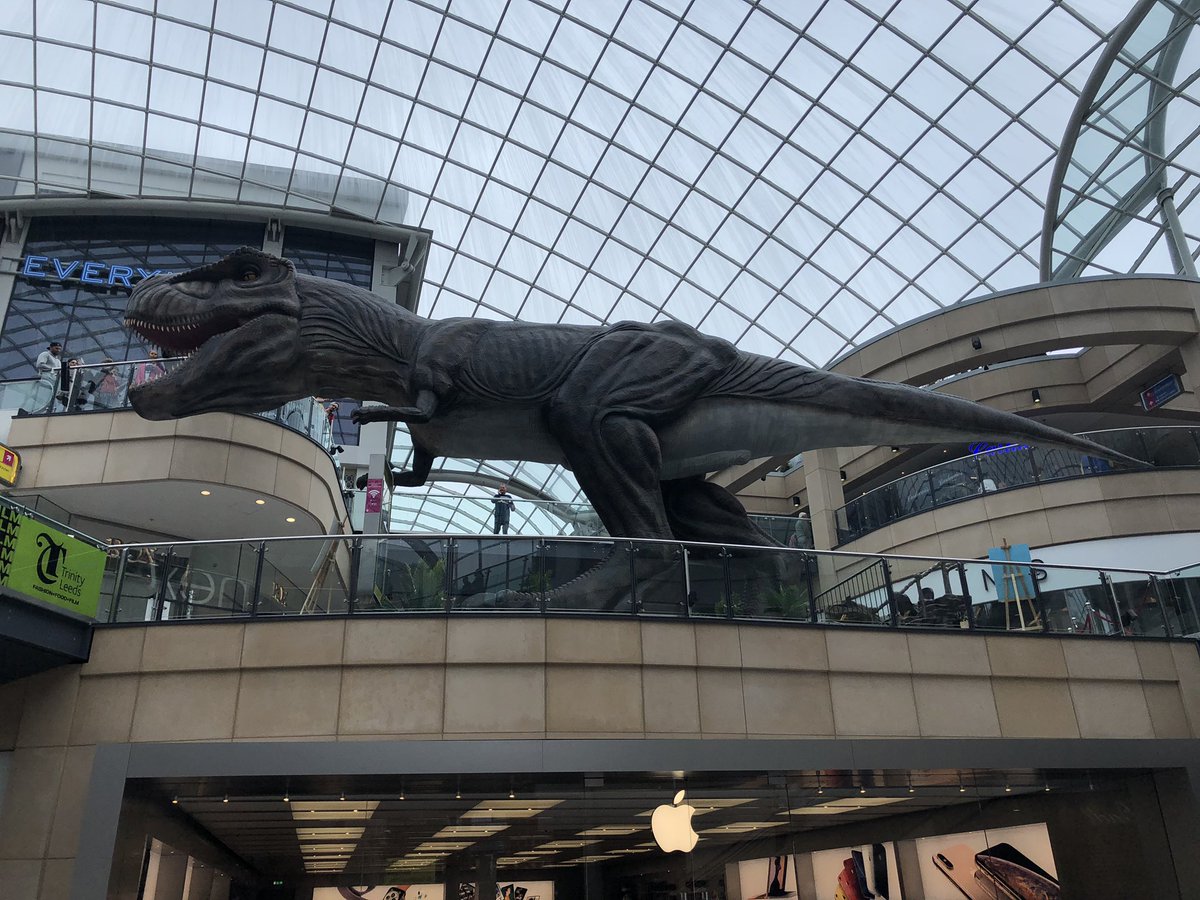 The_Volcano_Guy's tweet photo. Shopping in Leeds today, I was certainly not expecting to stumble across a giant, automated T-Rex in the middle of the shopping centre... #Leeds #DinosaursAreReal #trex #SayNoToExtinction! https://t.co/WH7Udsxp2D