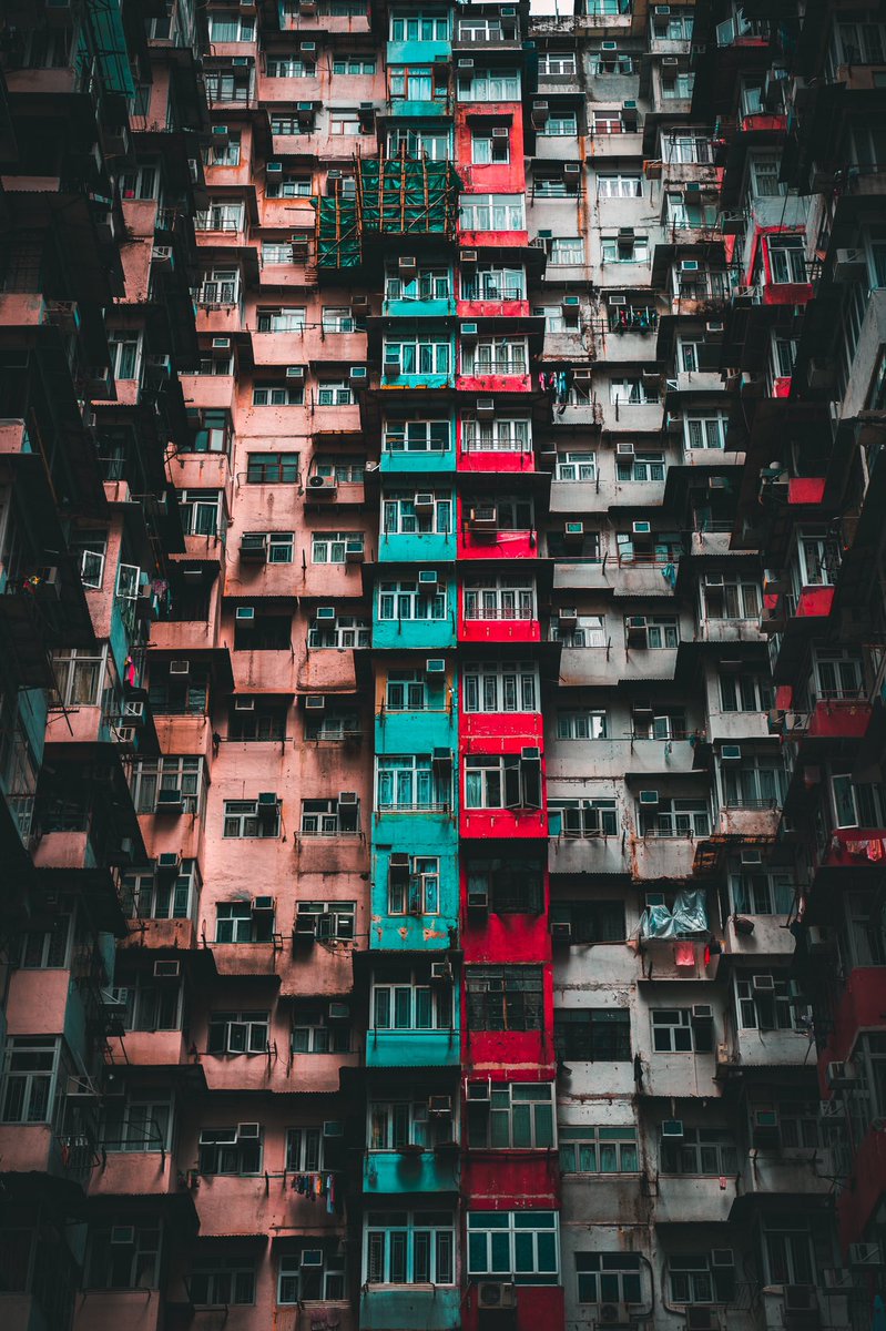 byMaxC's tweet photo. These low-income housing buildings were some of the most colorful things I saw in Hong Kong. https://t.co/9pHm2IOweK