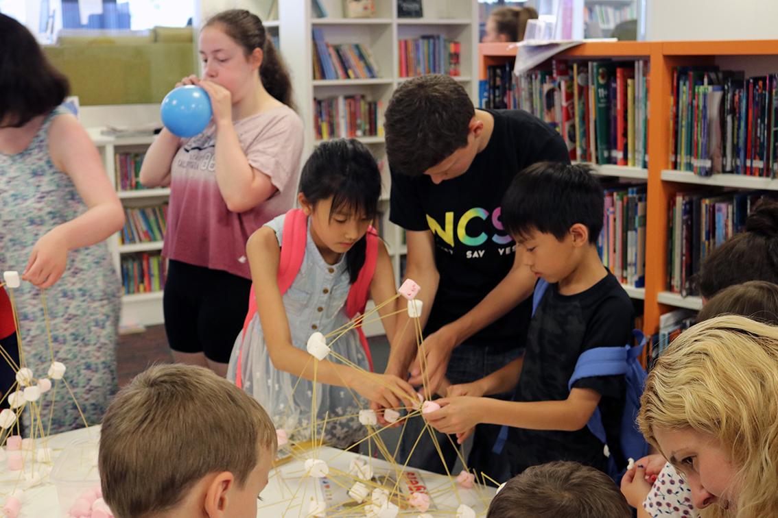 SuttonLibraries's tweet photo. The @NCS Challenge, a government funded youth project where young people are encouraged to get involved with their community, came to #SuttonLibrary on Fri. Inspired by this year’s Summer Reading Challenge theme ‘Space Chase’ they planned and organised a science based event. https://t.co/j9KtLDFJcP