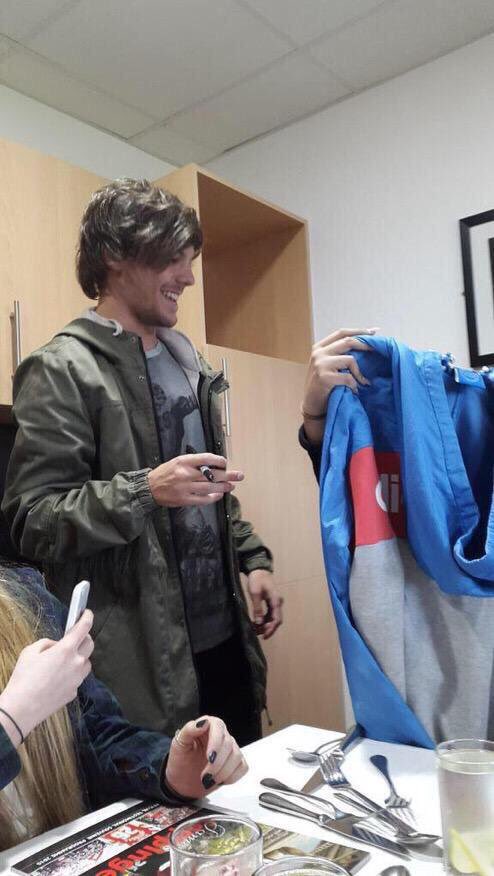 a fan gave louis an adidas jacket and then he wore it