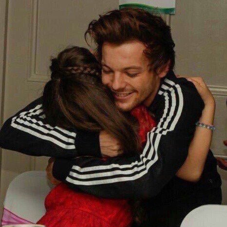 the way he hugs fans with his eyes closed