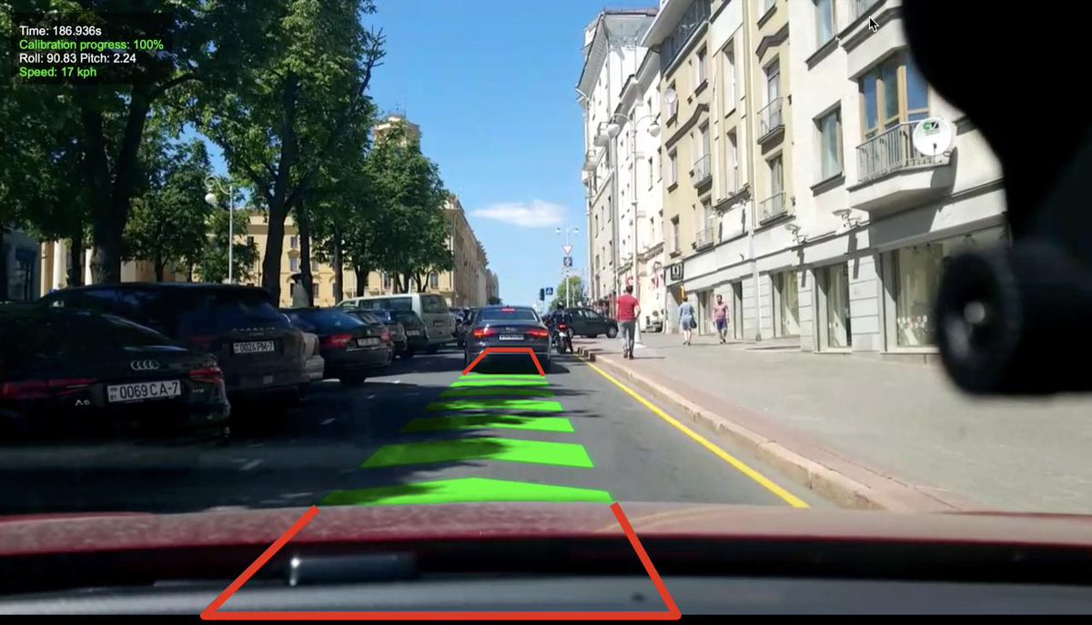 Mapbox's tweet photo. Red outlines show where the #VisionSDK uses segmentation to dynamically hides the tread marks so our route line doesn’t project over the dash or into the next car. https://t.co/qBMR2GweUi https://t.co/jvWkv3tzDR