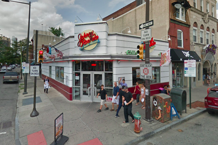 CorzoCenter's tweet photo. Street artist @kidHazo hangs 'Jawny Ratchets' sign at former Johnny Rockets in South Philly in support of art opening at @PARADIGMGS. Featuring additional artwork by Cornbread, Drew Leshko and Marissa Cianciulli. https://t.co/CRuGmjnvS1 https://t.co/UnVjpUkvmP