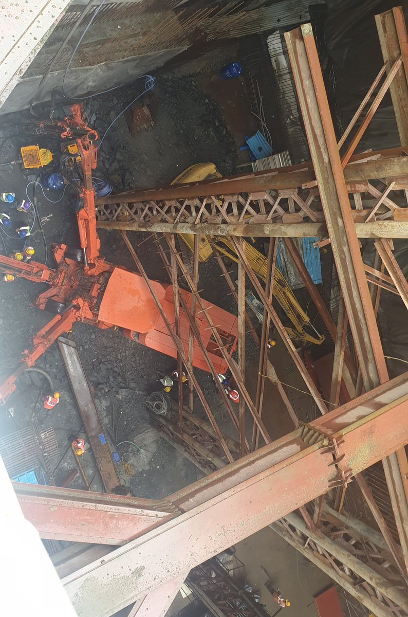 AshwiniBhide's tweet photo. A triple arm boomer deployed at #HutatmaChowk station on @MumbaiMetro3 for #NATM works. This station is built wth combination of #CutandCover and #NATM methods. One TBM will pass through cut & cover stan box while d other through NATM cavity. Challenging work but in good progress https://t.co/AwCOd1oAzW
