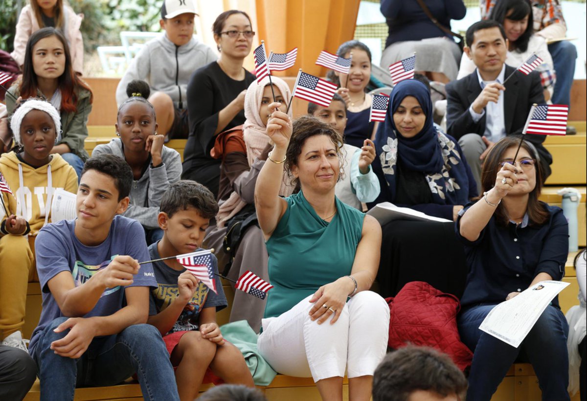 Children and their parents from around the Bay Area take part in a children's citizenship ceremony at Children's Fairyland in Oakland, Calif., on Monday, July 29, 2019. The U.S. Citizenship and Immigration Services San Francisco Field Office swore in 24 kids from 16 countries. © (Jane Tyska/Bay Area News Group)