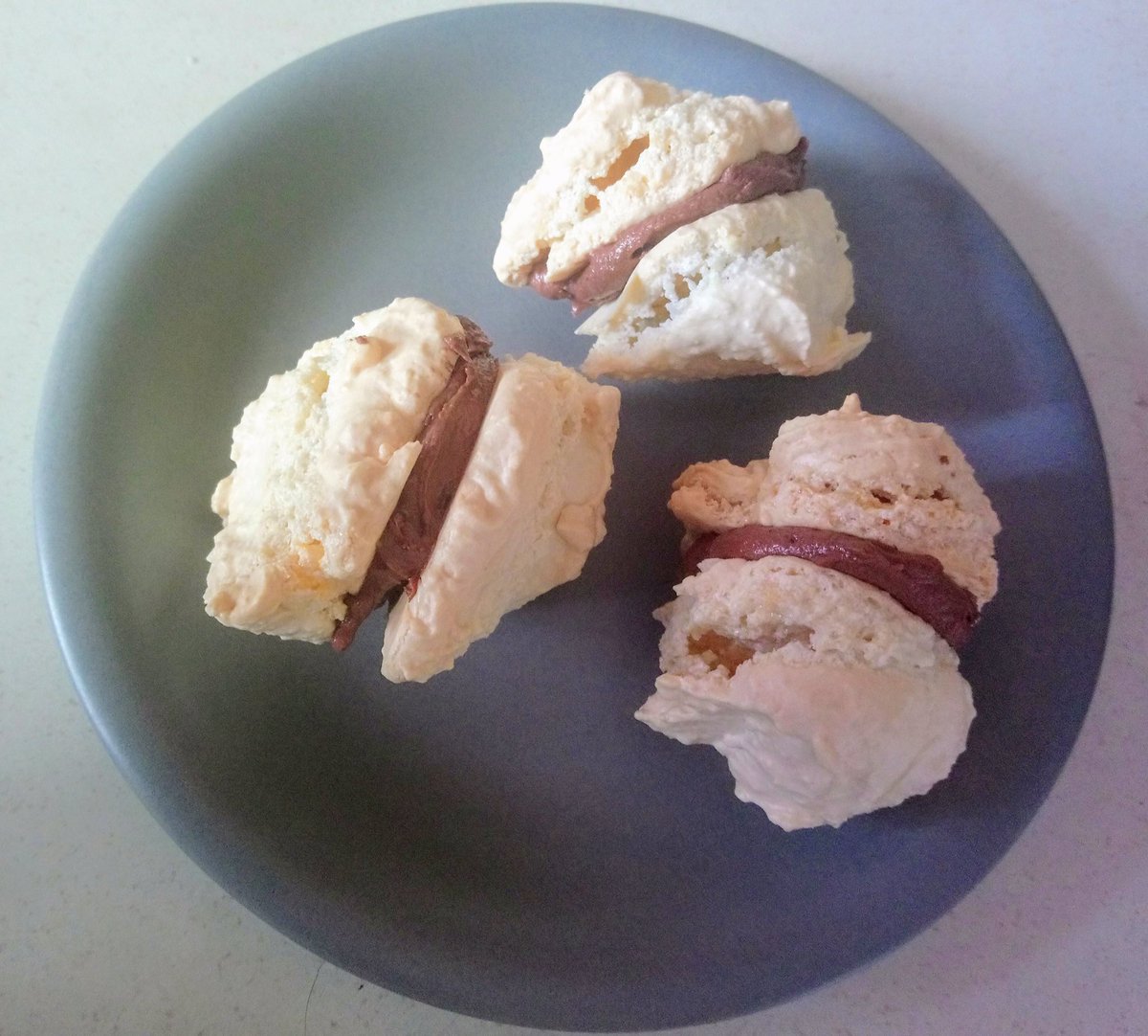 Rainy day, in the kitchen experimenting.
Vanilla macaroons with chocolate filling. Very tasty if a little out of control in shape.
epicgfadventures.home.blog/2019/07/30/van…

<a href="/DorsetFoodDrink/">Dorset Food & Drink</a> <a href="/gfliving/">Gluten-Free Living</a> <a href="/BloggersTribe/">BloggersTribe</a> <a href="/Dorset_Bloggers/">Dorset Lifestyle Bloggers</a> <a href="/Coeliac_UK/">Coeliac_UK</a> <a href="/GlutenFreeMore/">Gluten-Free & More</a>