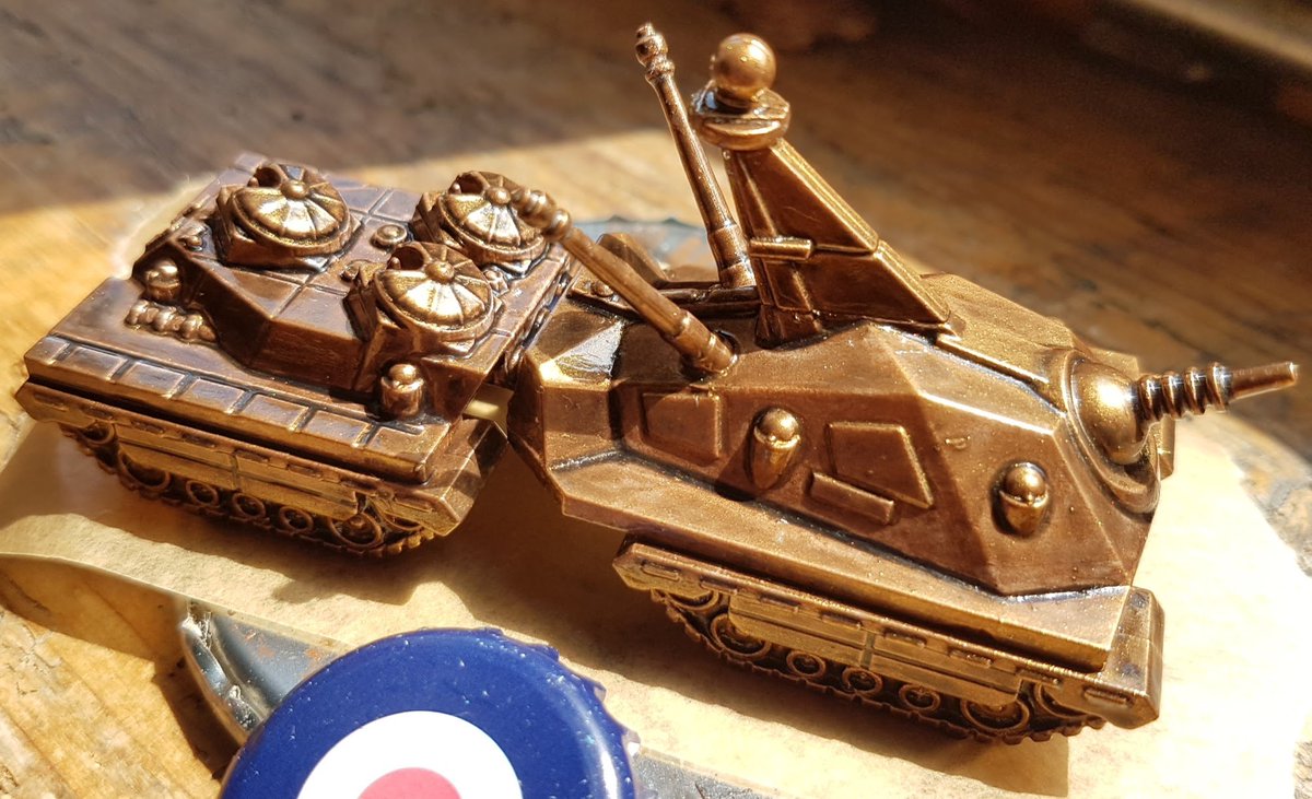sgbeal's tweet photo. Hey, @SJGames - your bronze Mark IV #Ogre #mini is now done. With a couple layers of gloss varnish, it's looking pretty snazzy (i don't mind saying). Possibly my best paint job to date. My repeated eternal thanks to @TwoBatsGaming for the wash formula which made this possible. https://t.co/fwdESufwDM