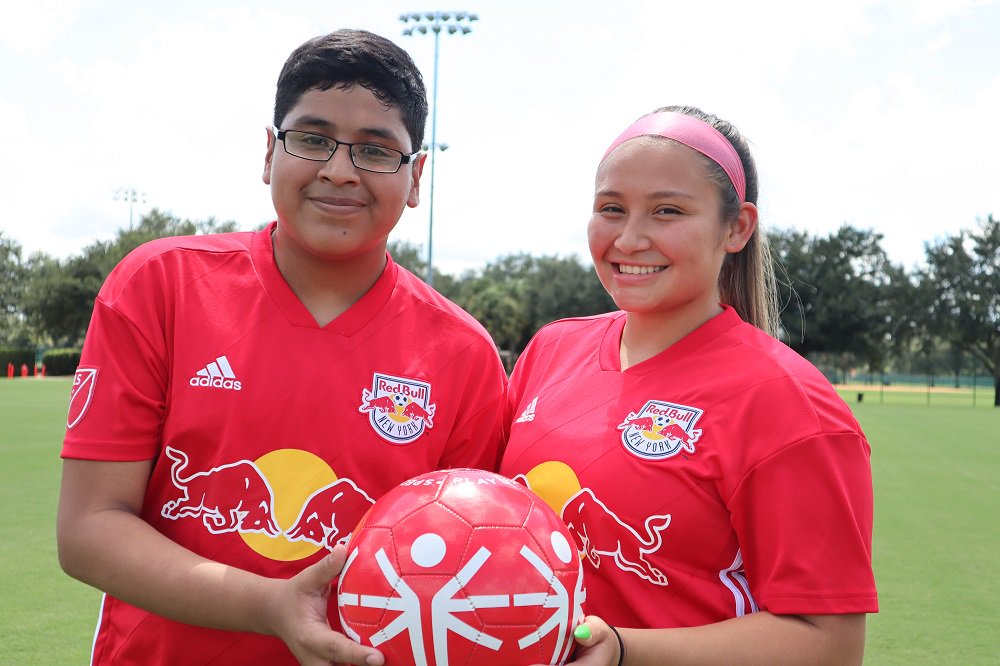 SpecialOlympics's tweet photo. Rocking in the red &amp; representing the @NewYorkRedBulls, we have Yoel Villalta &amp; Odalis Hernandez from @SONewJersey! #PlayUnifiedMLS #MLSAllStar https://t.co/UwaaS39URm