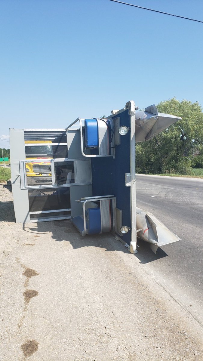 OPP_CR's tweet photo. Pontoon boat departs trailer on Cty Rd 30 just north of the town of #BrightonON on July 27th. #NthldOPP charged the male driver from Perth East Twp, ON under the HTA with having an insecure load. Keep roads safe and #securetheload.^kj https://t.co/0YLtgfsNyK