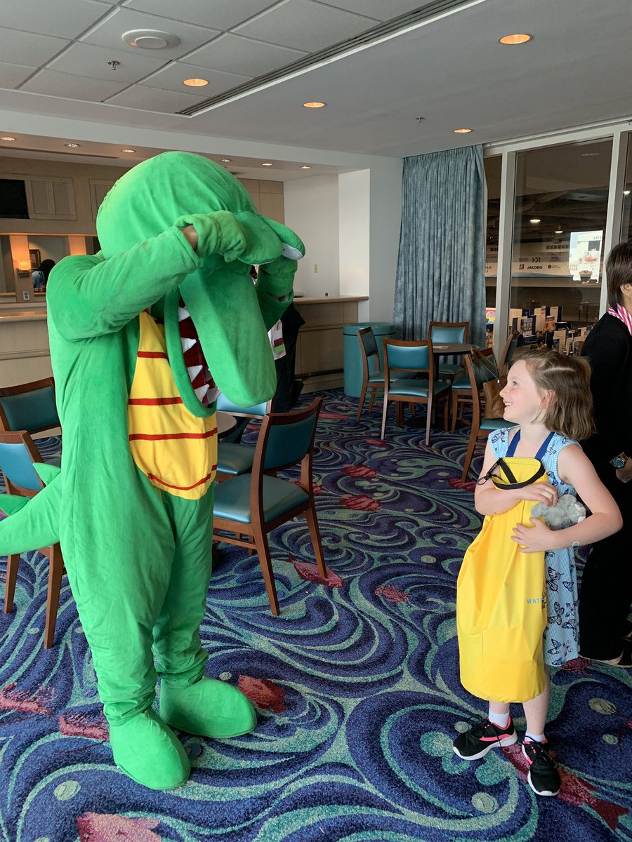 AlabamaWEA's tweet photo. Niles the crocodile stopped by #ALMSwaterJAM. He checked out the #awea Wave magazine and took pics with the kids (and kids at heart). Welcome to Mobile, Niles! @wef_org https://t.co/wxmEuod4WT