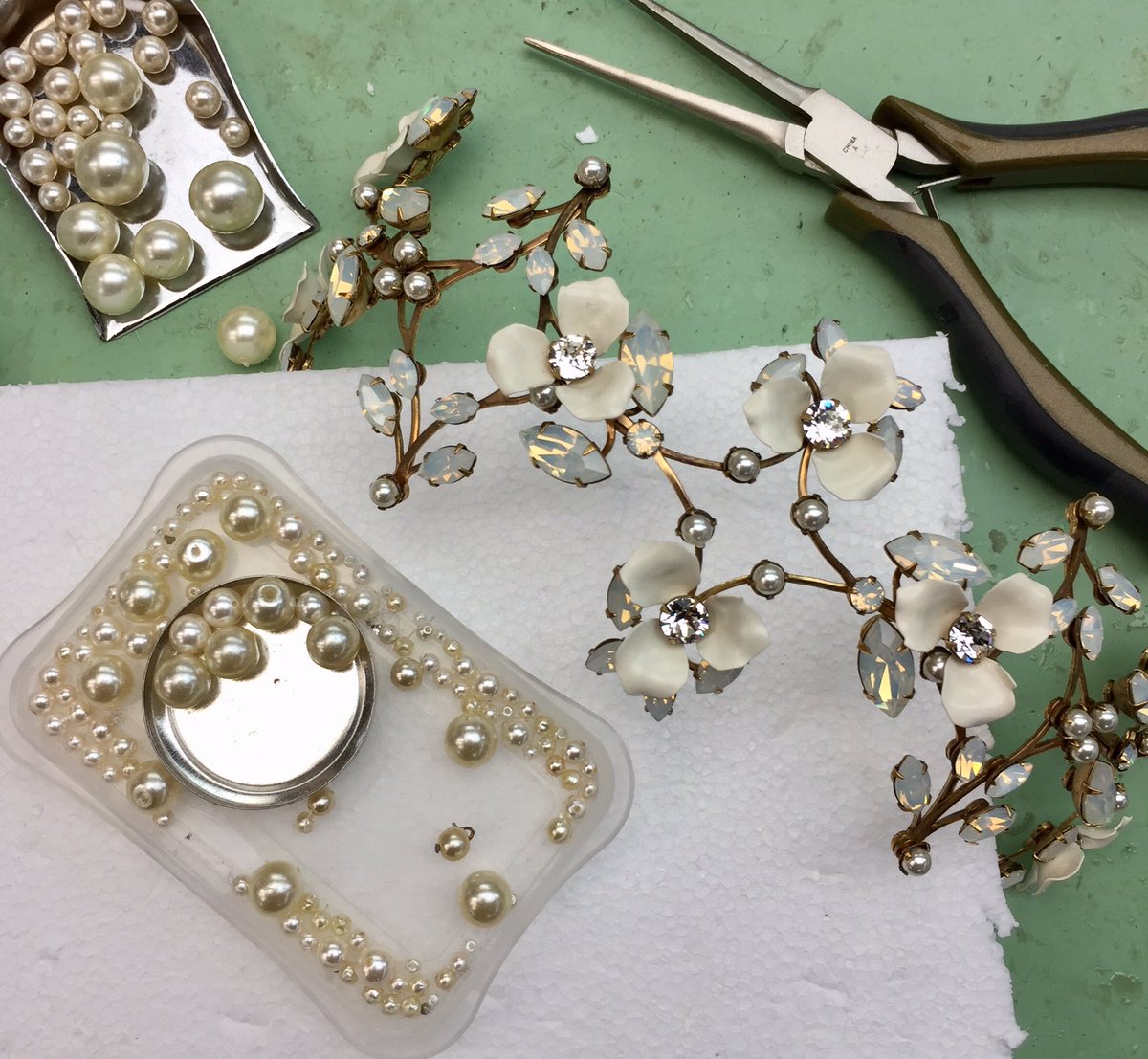 We are in the moment with a custom piece, and deciding to build on this color and material combo for a new piece at #bridalmarket - Stay tuned for the big #new reveal.  #bridalaccessories #parisbydebramoreland #headpiece