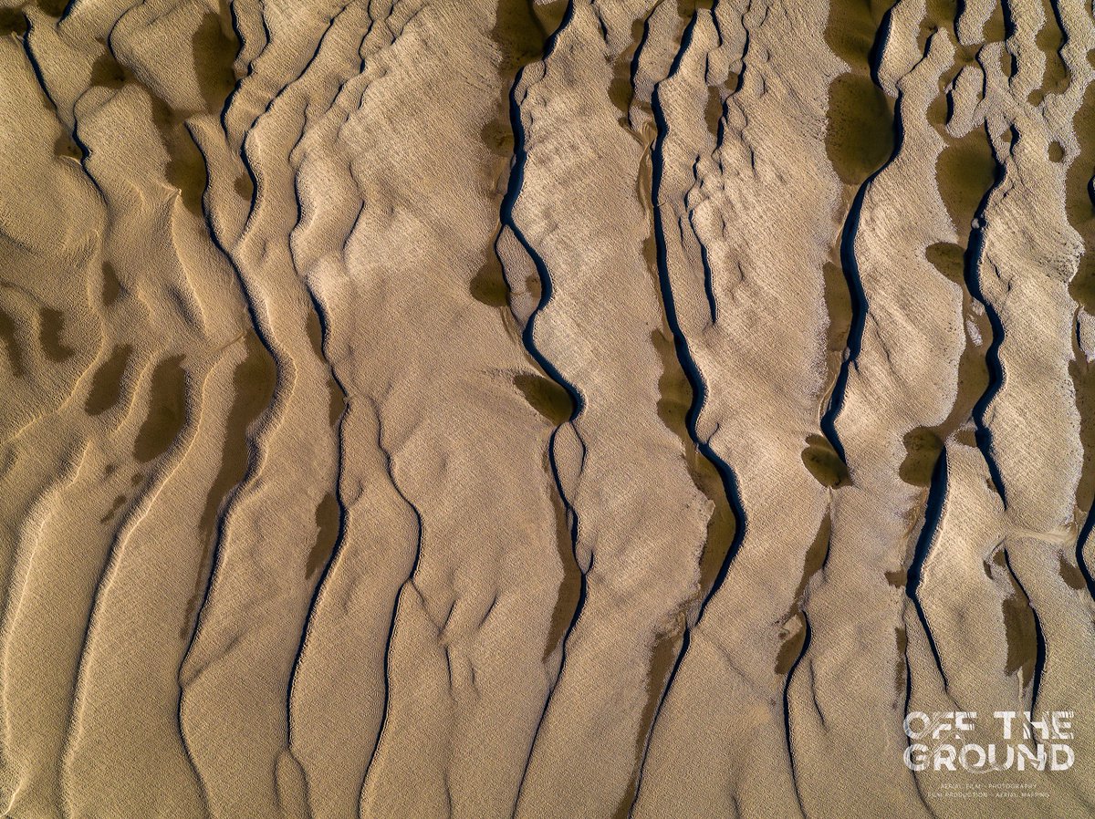 offthegroundtv's tweet photo. Deceptive perspective. Folds in the sand of the Conwy estuary from 400ft up. Prints now available direct from our online shop: https://t.co/2yzg7LqKxo #conwy #northwales #cymru #drone #photography #aerial https://t.co/bPZ2jsjXtO