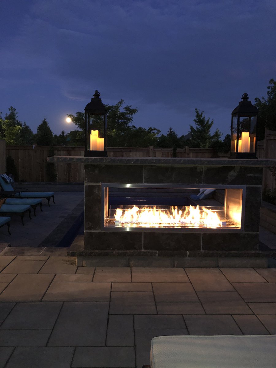 RussEnglish's tweet photo. Fire by the pool under a full moon! #ILoveSummer https://t.co/4t5rtaTbkz