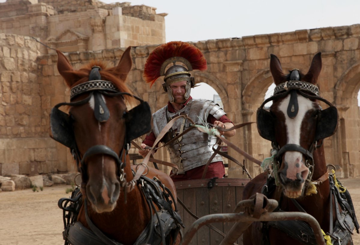 Discovery's tweet image. On this #WhereInTheWorldWednesday I’m traveling across #Jordan to investigate a one-of-a-kind #DeadSeaScroll etched with riddles that could lead to an ancient treasure. Also, my rental car handles terribly, but at least it’s a convertible. 🐎

#ExpeditionUnknown starts NOW.