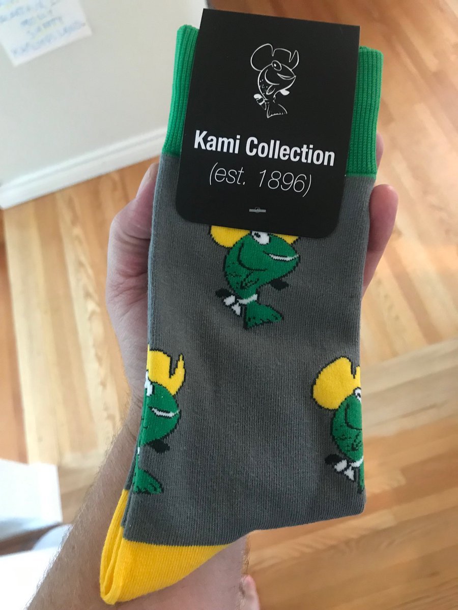 DHerbertCBC's tweet photo. A wonderful gift from my amazing wife who tolerates my love and collection of #KamitheFish merchandise. Well done @KamloopsChamber, nice job on the socks! #Kamloops https://t.co/3fO3hBo6Gt