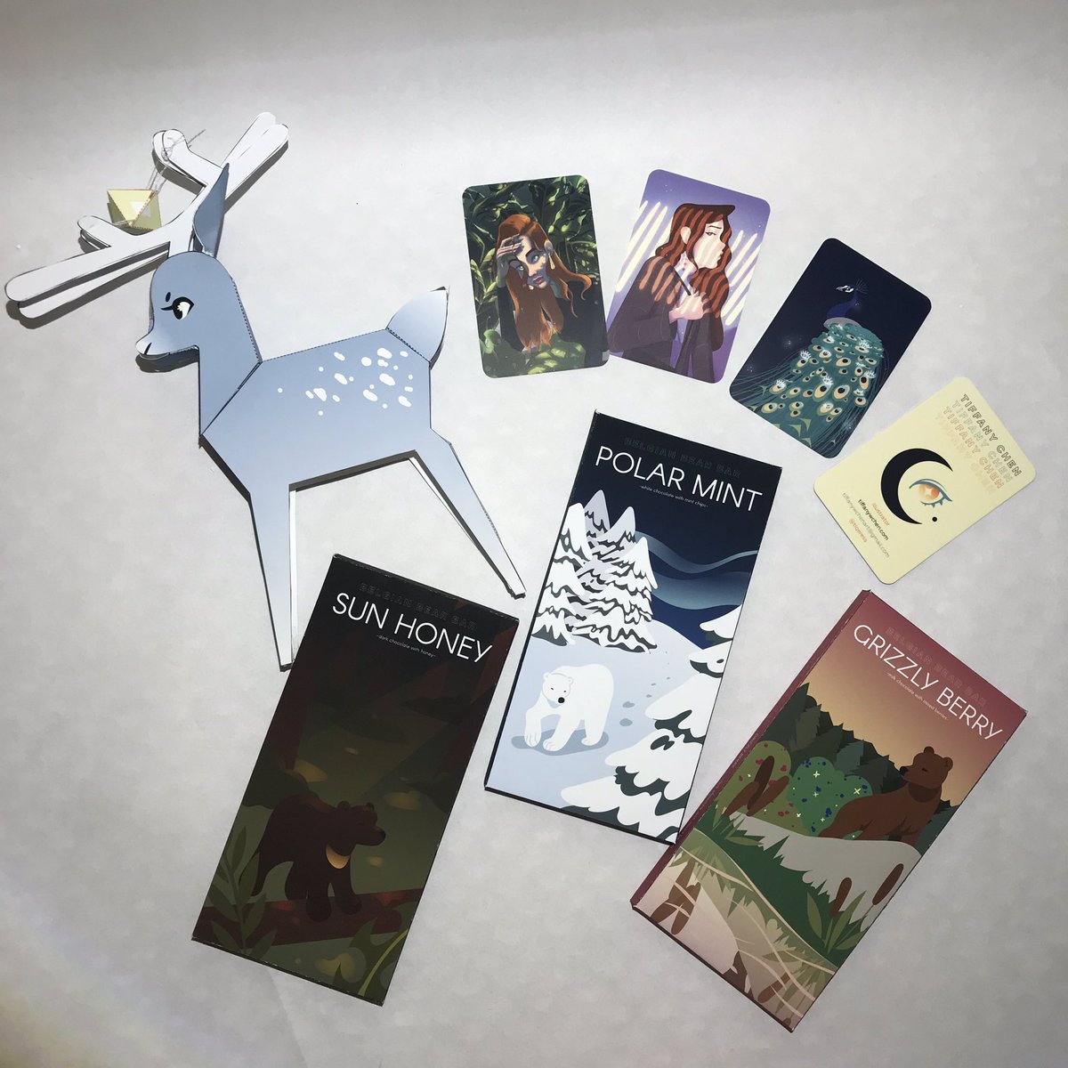 tiqeress's tweet photo. made some things for my #digitalillustration class and i’m really happy with how it turned out ☺️ (1 final down and 3 more to go!!!) #businesscards #papertoy #chocolatepackage https://t.co/XAgX3nYuly