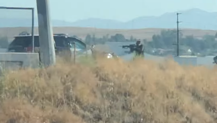 kreshjun's tweet photo. Insane witness video shows a man shooting high powered rifle at police in Riverside, CA. (at least two officers injured, one confirmed dead)  
https://t.co/2pSzmciapa https://t.co/Emui7e9ANY