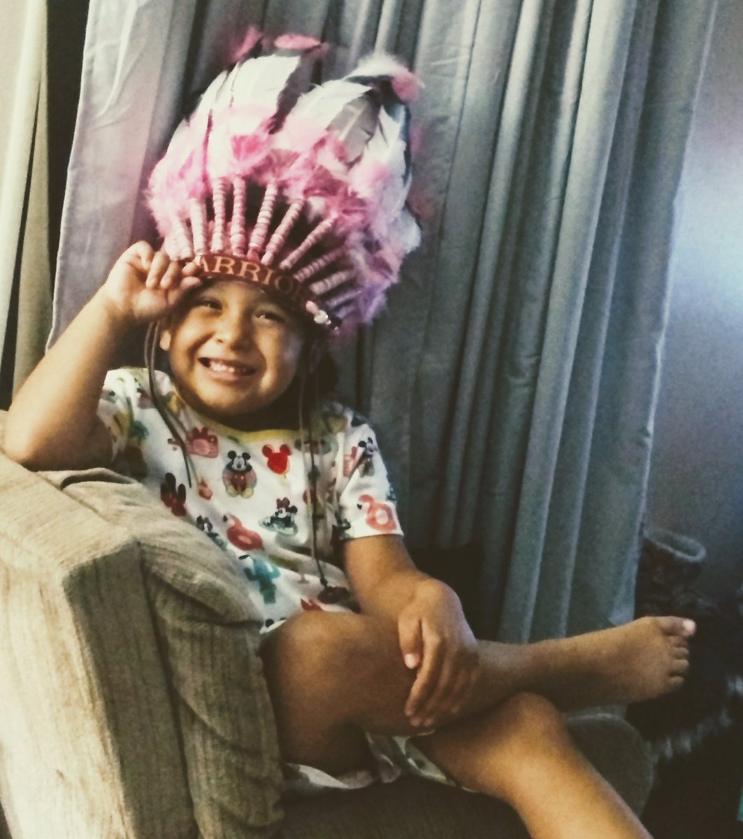 WahyaChronicles's tweet photo. My daughter is wearing my Susan Komen inspired Native American warrior headdress that I made over 5 years ago for a very special Komen walk.... I need to work on it and get it back to it the way it was. Her hand is covering it, but it says Warrior across the forehead. https://t.co/ks8PdE9g3T