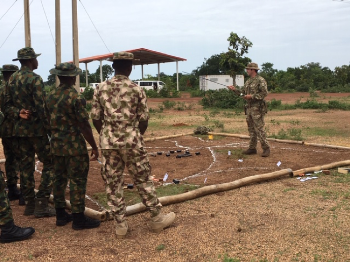 BritishArmy's tweet photo. 2 @LANCS_REGT are currently deployed to Nigeria training the Nigerian Army for their fight against the Islamic State of West Africa. 

Here a CSgt delivers elements of Company Orders before the final test of the pre-deployment course. 

More info:https://t.co/FRsSElQvdd https://t.co/CSLC2QqJvM