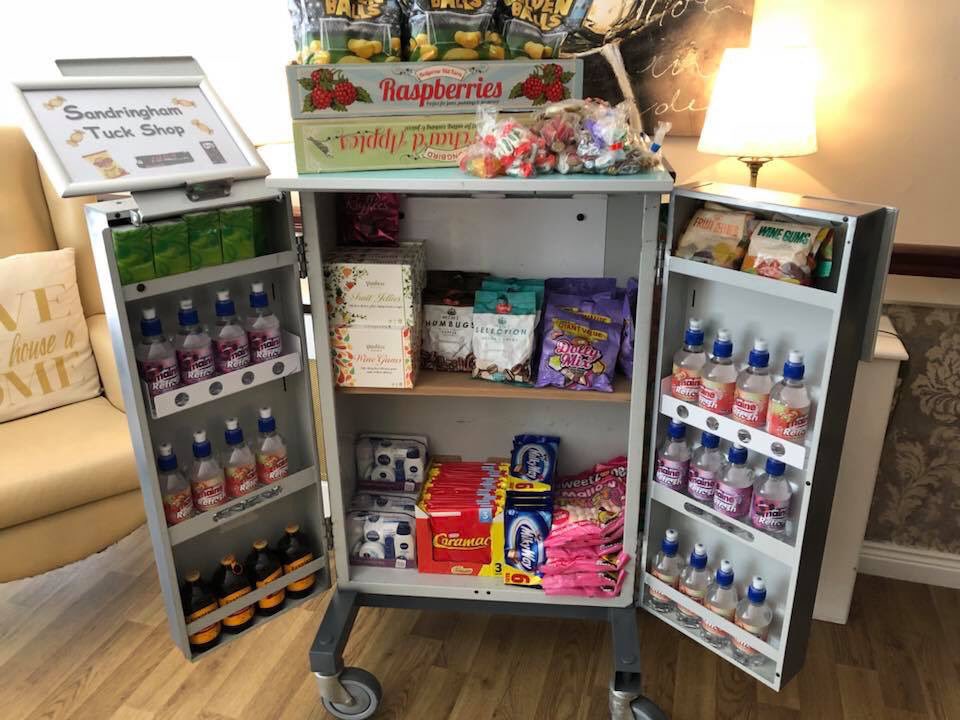 HomeSandringham's tweet photo. 🎈 Today our tuck shop is 1 year old!!!!! 🎈
Brought lots of smiles and sweet and savoury treats to the amazing Residents of Sandringham!!! 🍬 🍭 🥤 📰 🍫  it’s amazing how an old metal trolley can light up a room 😃@FourSeasonsHCUK @tpalmer321 @samjbright @Carolcousins3 https://t.co/a8fz6qeRO8